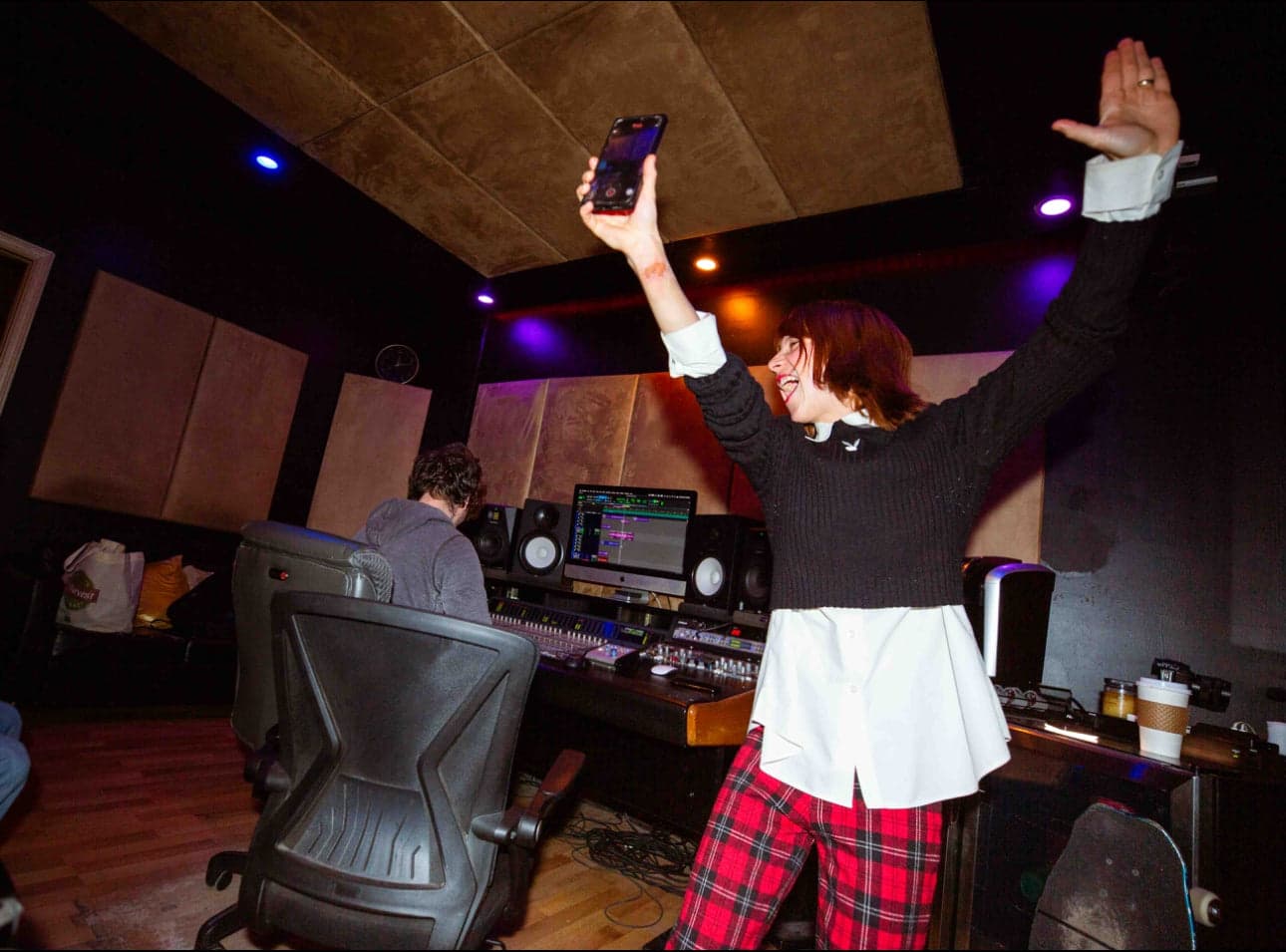 Chloe Chaidez celebrating inside the PSY SOUND recording studio